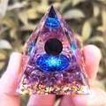 Orgone energy pyramid with purple amethyst crystals and sacred geometry held in hand - Hexagram Amethyst Gold Foil / Small