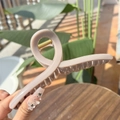 Close-up of a large matte nude hair claw clip with a strong gold metal spring mechanism - Hanger (Approx 15cm) / Stone Grey
