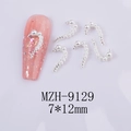 Detailed view of silver heart-shaped pearl nail charm decoration with dimensions 7x12mm - Heart Style (MZH-9129)