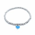 Detailed macro view of 4mm silver bead bracelet with blue enamel heart charm pendant - Silver Blue