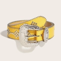 Detail of yellow crocodile embossed leather belt with silver studs and western buckle - Yellow