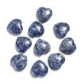 Close-up of 20mm heart-shaped sodalite stones with polished blue and white textures - Blue Spot Stone