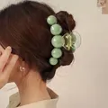 Green sphere beaded hair claw clip for women shown on deep brown hair back view - 5-Ball Large Claw (Green)