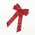 Detail of red satin bow hair clip with white pearls on elegant long hanging ribbons - Red