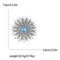 Elegante spilla a raggiera in lega d'argento con cristallo azzurro e zirconi bianchi - Bianco
