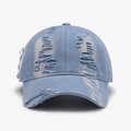 Washed light blue denim baseball cap with vintage distressed ripped details and worn finish - Grey Blue