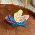 Colorful acetate butterfly hair claw clip with rhinestones shown on wooden tray - Purple Red-Green-Pink Rhinestone Drip Oil Butterfly