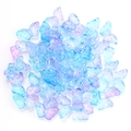 Macro view of 15mm purple and blue gradient butterfly glass beads for DIY jewelry making - Lake Blue Purple Gradient