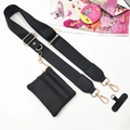 Detail of adjustable black nylon phone strap with a matching leather zipper pouch - Black Nylon Strap And Pouch And Phone Patch
