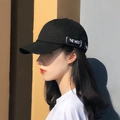 Classic black cotton baseball cap with white THE MOST embroidery on the side - The Most Black