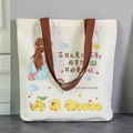 Off-white canvas tote bag with cute chicken illustration and brown handles - Flower Seasons