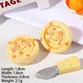 Detailed macro view of 1.8cm miniature resin egg tart with cute face for DIY crafts - Bear Cream Egg Tart