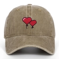 Detailed embroidery of two red heart balloons on a vintage washed cotton baseball cap - Adjustable / Khaki