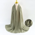 Light green pearl chiffon scarf on mannequin showing fabric texture and drape - Light Green
