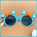 Cute blue Minnie Mouse style sunglasses with orange polka dot bow for little girls - Blue
