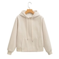 Detail of beige hooded sweatshirt hanging on a wooden hanger with visible size S label - S / Apricot Top