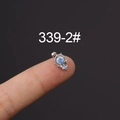 Silver stainless steel stud earring featuring a round light blue zircon with lace border - Silver Blue Zircon Style (HSPJ339-2#)
