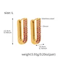 Detailed view of U-shaped stainless steel earrings with pink and purple zircon stones - Large / Pink