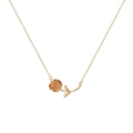 Golden necklace with rose pendant featuring a delicate pink gem inlay on white background - October