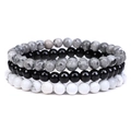 Macro detail of three-piece beaded bracelet set featuring black, white, and grey natural stones - 6mm Map Stone & Onyx & White Turquoise