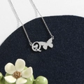 Silver stainless steel necklace with initial Q heart pendant and a small butterfly charm - Silver Q