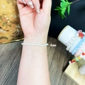 Detail view of 4mm pearl elastic bracelet showing lustrous white beads on wrist - 4mm Pearl Bracelet