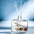 Reed diffuser with blue dried flowers in glass bottle and five white scent sticks - Jasmine