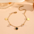 Gold stainless steel bracelet with black and gold clover charms and clear gemstones - Gold Black Shell Bracelet (C521)