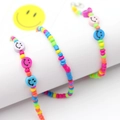 Colorful beaded eyewear chain with happy smiley face charms and bright resin beads - Smiley Face Light