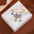 Golden Evil Eye safety pin brooch with Hamsa Hand and tassel crystal pendants - Hamsa with Crystal Style (Z275)