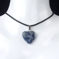 Blue and white sodalite heart pendant necklace with black cord on a white mannequin - Sodalite