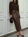 Detail of high-waist faux leather skirt with side slit in elegant dark brown color - S / Brown