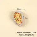 Realistic artificial oyster food model measuring 6cm by 3.8cm for decor and display - Chili Cheese Oyster - No Hook