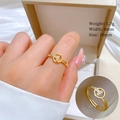 Adjustable golden open ring with T-shaped crystal inlay shown on hand with jewelry box - Adjustable Open / Gold (J0055)