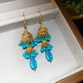 Macro view of Jhumka style earrings with turquoise beads in a jewelry box - Geometric Hollow Bell Glass Tassel Ear Hook (5#)