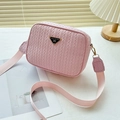 Pink woven texture crossbody bag for women with wide fabric strap and golden metal hardware - Pink