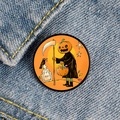 Halloween pumpkin reaper enamel pin badge featuring R.I.P tombstone on denim jacket - Reaper Pumpkin and Tombstone RIP Style (XZ6936)