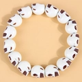 Pulsera elástica de calaveras para mujer con cuentas en tono crema estilo hueso tallado - Blanco