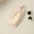 Portable travel underwear storage bag in beige fabric with top handle for organization - Beige