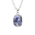 Close-up of blue natural crystal stone pendant with silver clasp and metallic chain - Silver + Lapis Lazuli