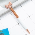 Elegant rose gold and white bow tie metal ballpoint pen with sparkling gold glitter fill - White (Rose Gold)