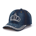 Detail of blue denim baseball cap featuring rhinestone crown motif and sequined brim - Adjustable / Light Wash Denim