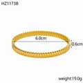 Macro detail of 18K gold plated open bangle showing 6.0cm diameter and 0.6cm width - Inner Diameter 6.0cm Width 0.6cm / Gold (Ribbed)