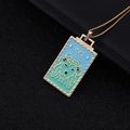 Golden tarot pendant necklace featuring Leo zodiac sign with blue-green gradient enamel - 07-Blue Green Gradient Lion