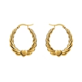 Detail of gold twisted hoop earrings with heart charms and secure latch back closure - Twisted Heart Style