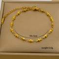 Detail of 18K gold-plated bead chain with lobster clasp and extension on jewelry box - Fine Bead Chain (10-16)