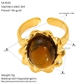 Detalle de anillo en acero chapado en oro 18k con ojo de gato e información de medidas - Estilo Flor con Ojo de Gato (SR350G)
