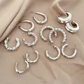 Luxury silver-tone 12-piece geometric earring set with textured hoop designs - 12pcs Set / Silver