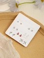 Detailed set of 6 pairs of silver earrings with heart, star, and butterfly shapes on cards - Silver Star Heart Airplane (FX885-14)