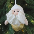 Golden Christmas Santa plush ornament with white knit beard hanging on a festive tree - Gold Santa Claus